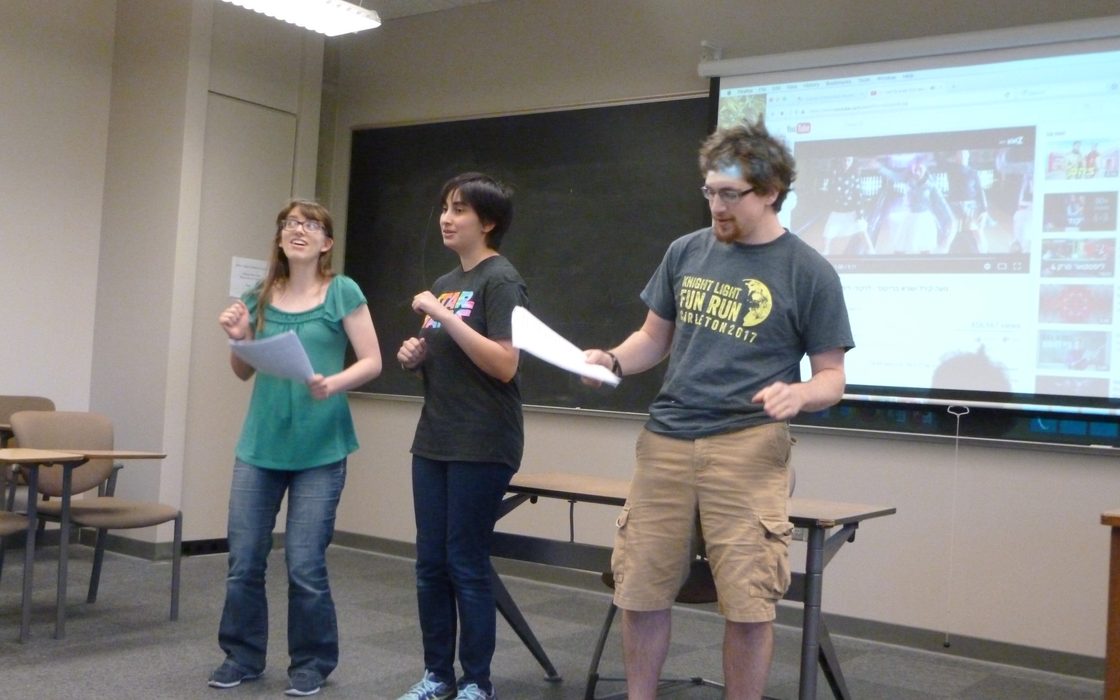 Students performing karaoke in Hebrew.