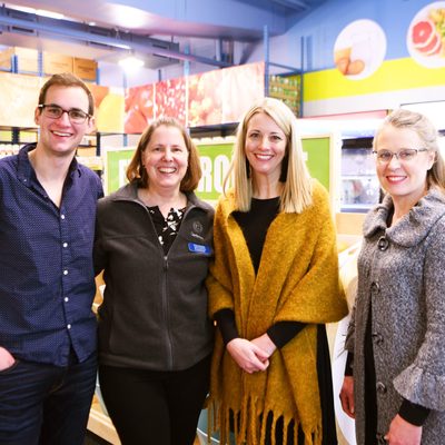 Carleton representatives and community partners at the grand reopening of the Northfield Food Shelf.