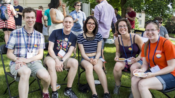 Classmates at a reunion reception