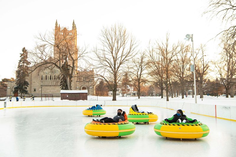 Bumper cars on an ice rink on the bald spot during the winter