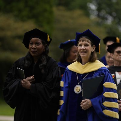 Alison Byerly and Isabel Wilkerson walking together