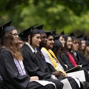 Students sitting at commencement