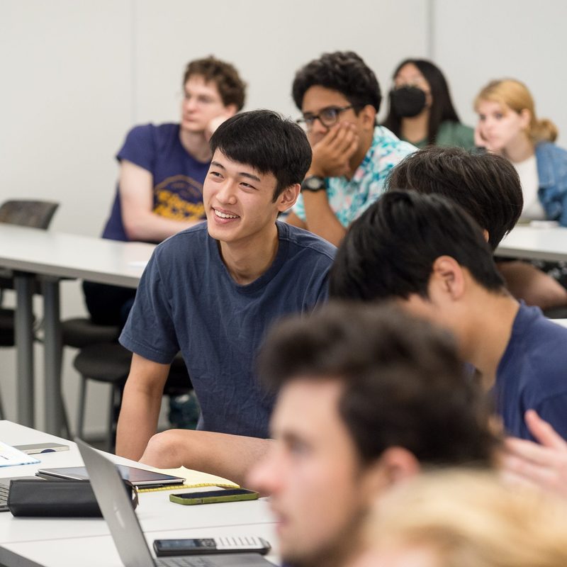 student smiling in class