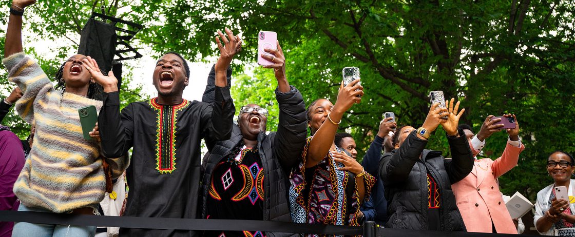 families cheer for their graduating students at commencement