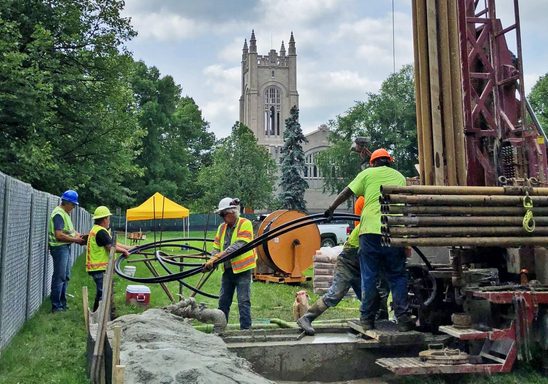Drilling on the Bald Spot with the Chapel in the background