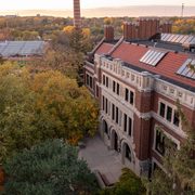 Aerial photo of Leighton Hall in the fall during sunset.