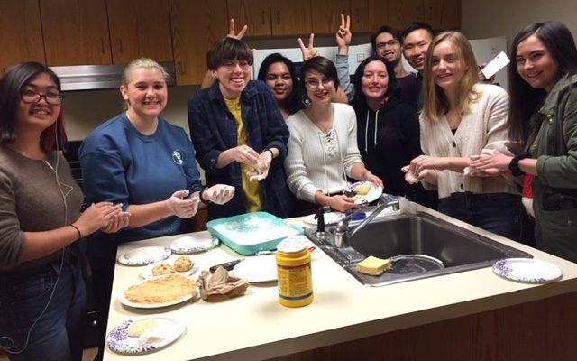 Students preparing food for Japanese New Year celebration.