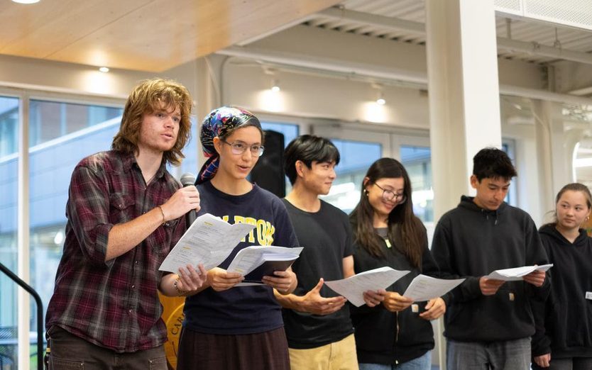 Students perform at Poetry Without Borders, a college-wide event celebrating the beauty and diversity of languages and cultures.