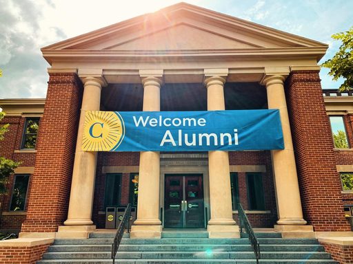 Sayles-Hill featuring a Welcome Alumni sign.