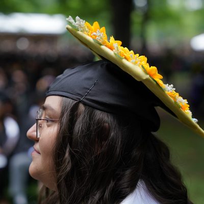 a student's mortarboard decorated with florals