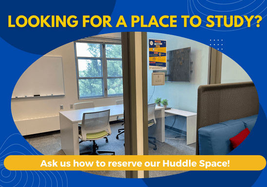 Empty huddle space photographed from the outside showing a table, whiteboard, and TV that students can use. Title is 